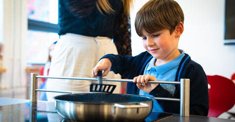 St-Georges-British-International-School-child-cooking