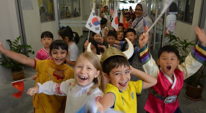 Image of ISKL children waving flags