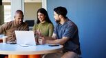 stock-image-people-looking-at-laptop