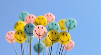 Image-of-smiley-faces-on-sticks