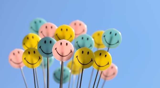 Image-of-smiley-faces-on-sticks