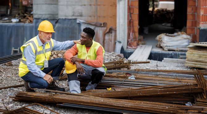 men-construction-site-talking