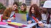 image-of-happy-students-at-laptop-phone