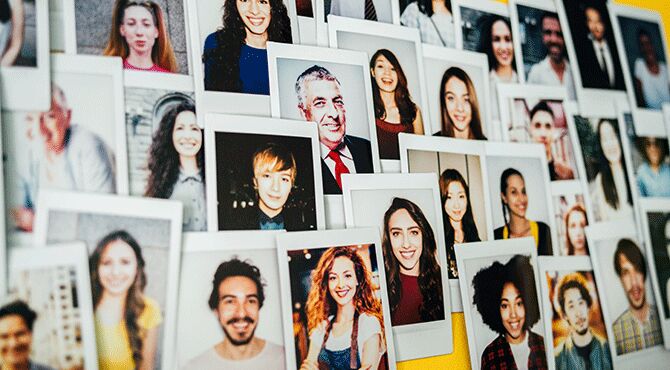 Profile photos on a wall